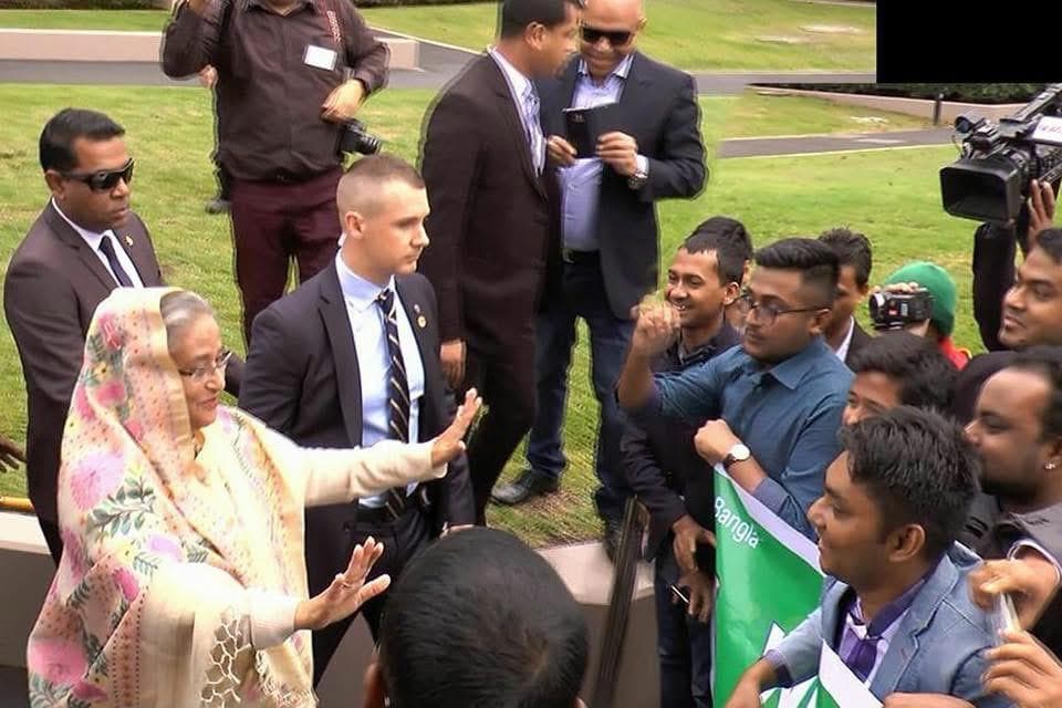 Greeting supporters during an outdoor public appearance